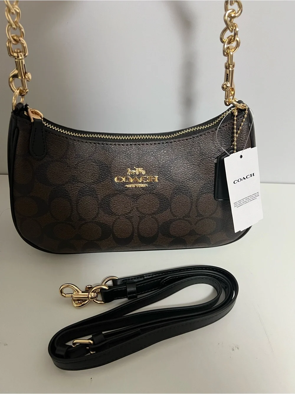 Coach Brown Signature Canvas Shoulder Bag with Black Trim and Gold Hardware